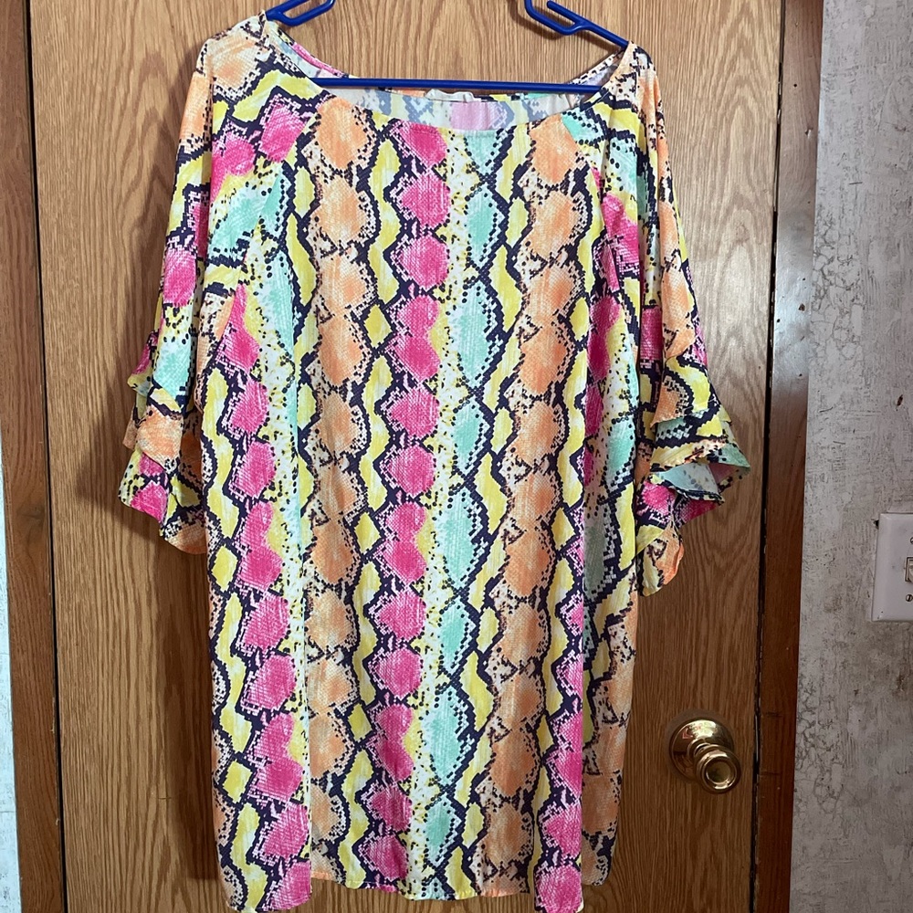 This is a multi colored sleeve snake print shirt